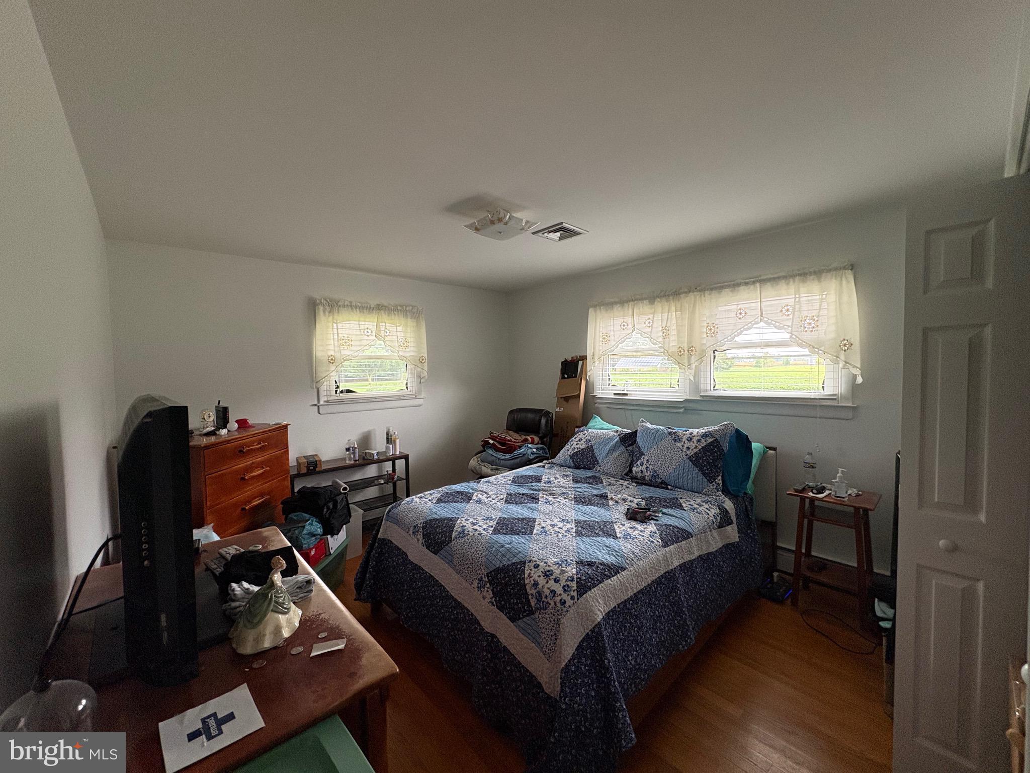 148 Amwellbury Road Salem, NJ 08079 - Photo 18 of 24 a bedroom with bed and a window