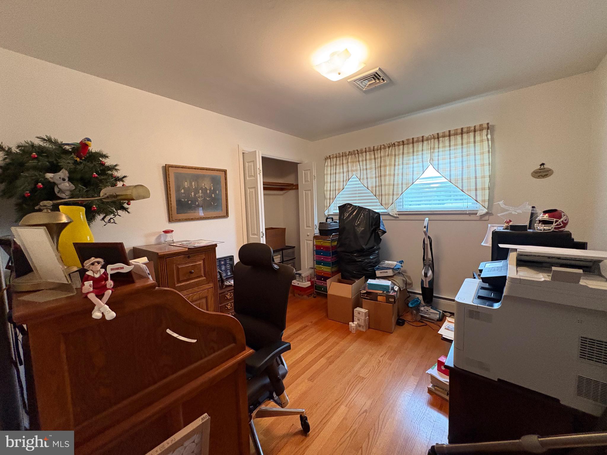 148 Amwellbury Road Salem, NJ 08079 - Photo 19 of 24 a living room with furniture and a wooden floor