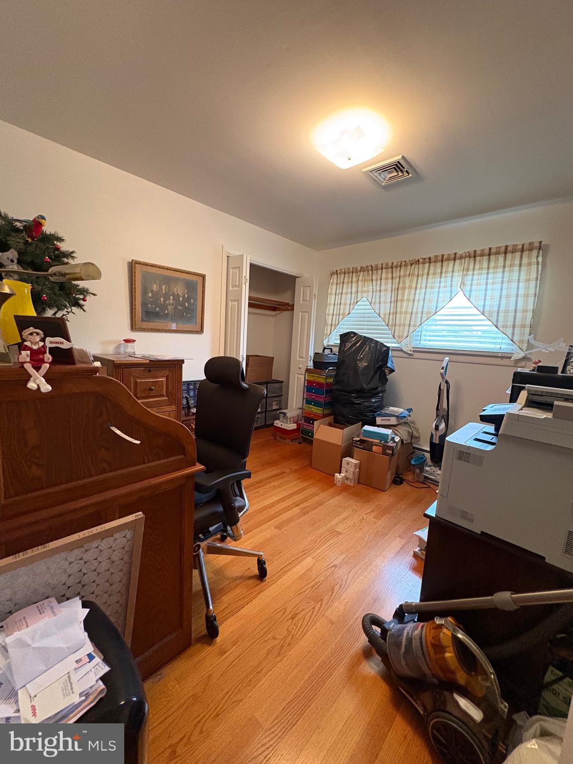 148 Amwellbury Road Salem, NJ 08079 - Photo 20 of 24 a view of a livingroom with workspace and a couch