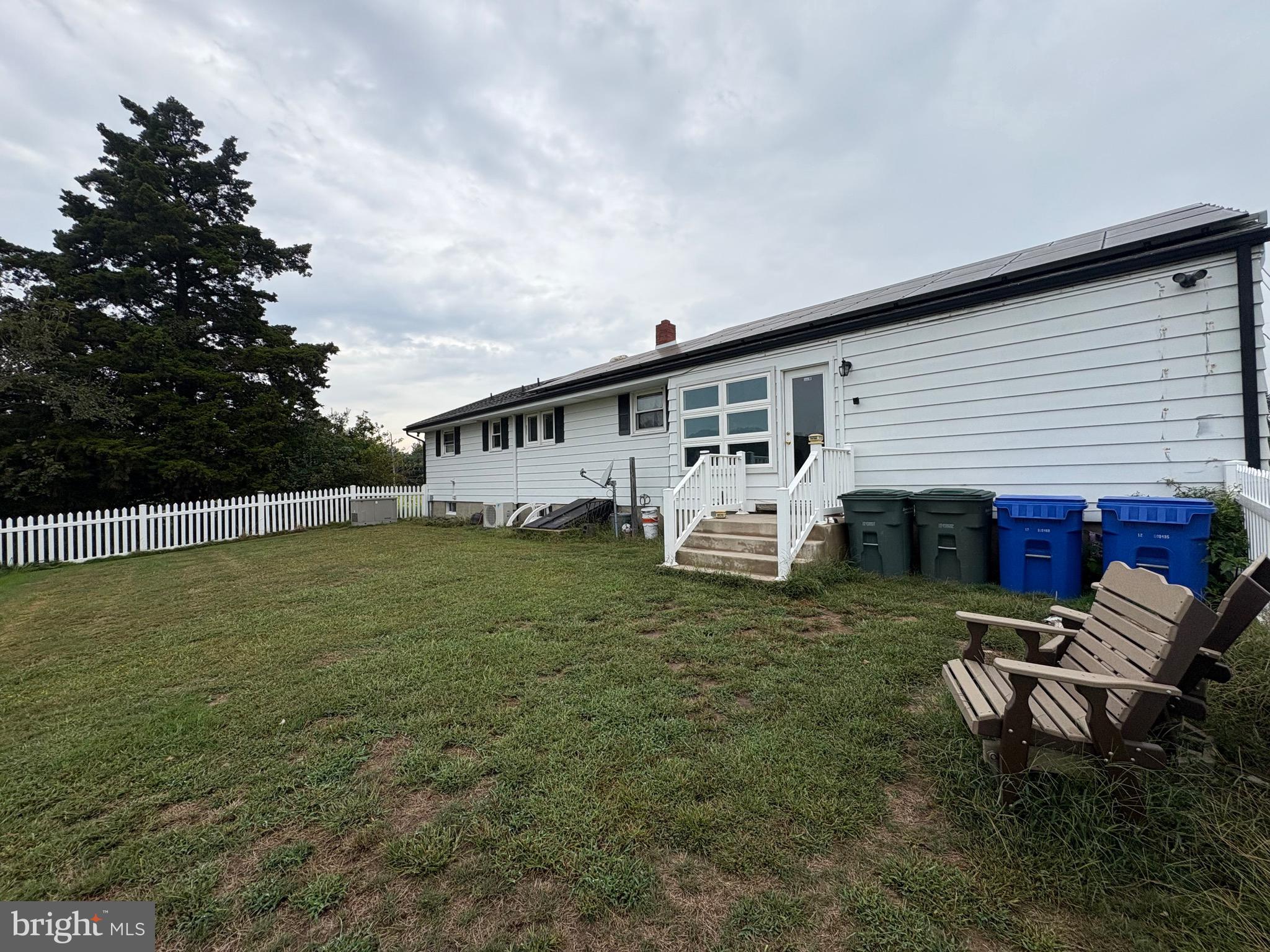 148 Amwellbury Road Salem, NJ 08079 - Photo 6 of 24 a view of a house with backyard and sitting area