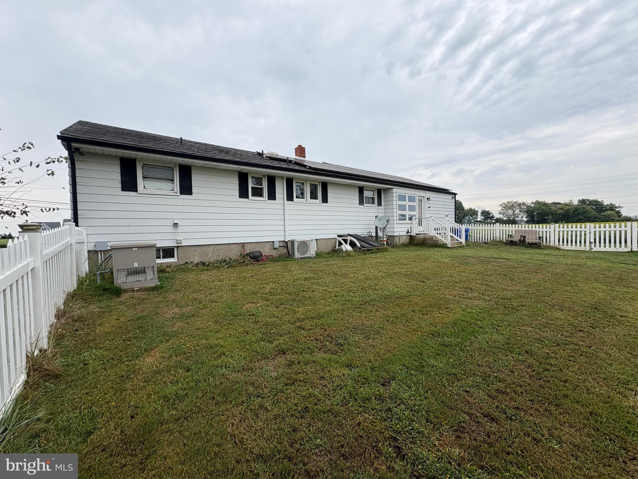 148 Amwellbury Road Salem, NJ 08079 - Photo 7 of 24 a house that is sitting in the grass