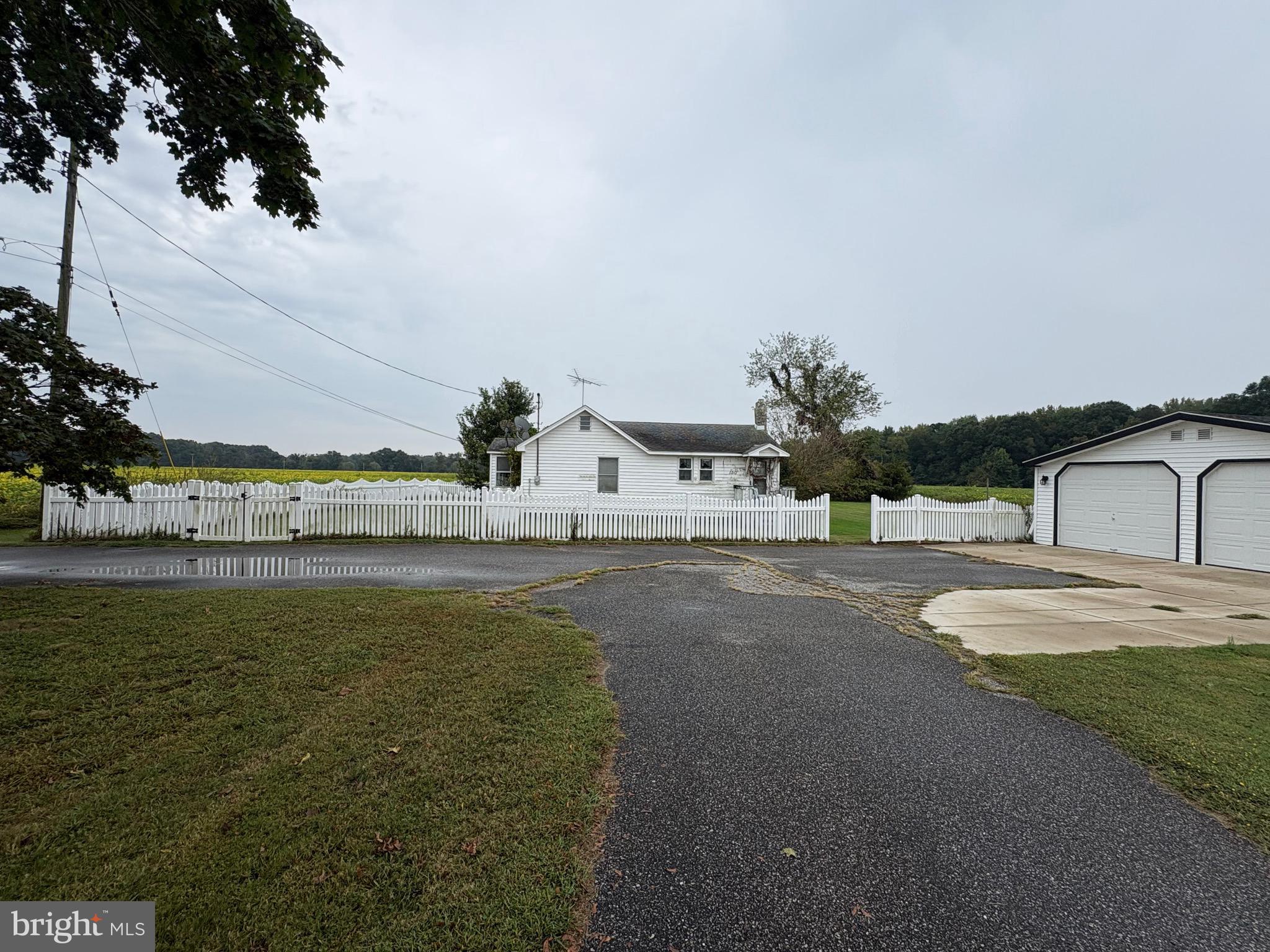 148 Amwellbury Road Salem, NJ 08079 - Photo 10 of 24 a view of swimming pool with a yard and seating area