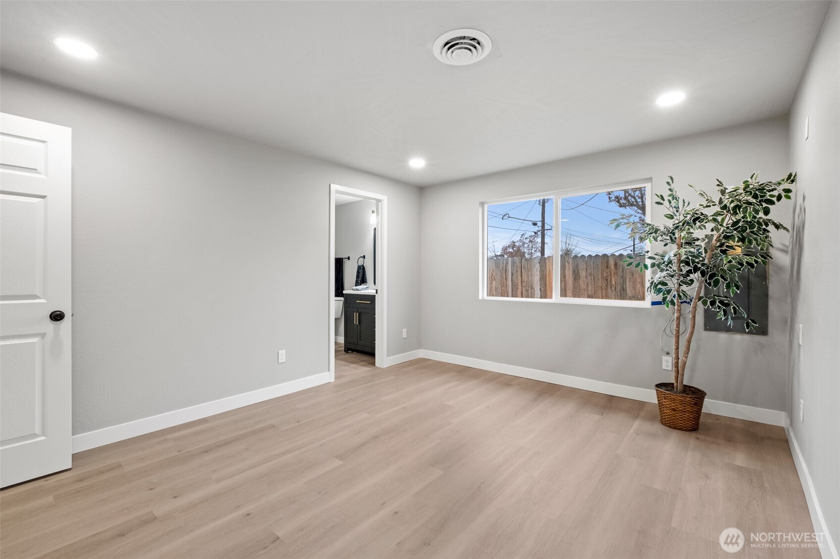 307 3rd Avenue Northeast Quincy, WA 98848 - Photo 11 of 26 a view of an empty room with a window