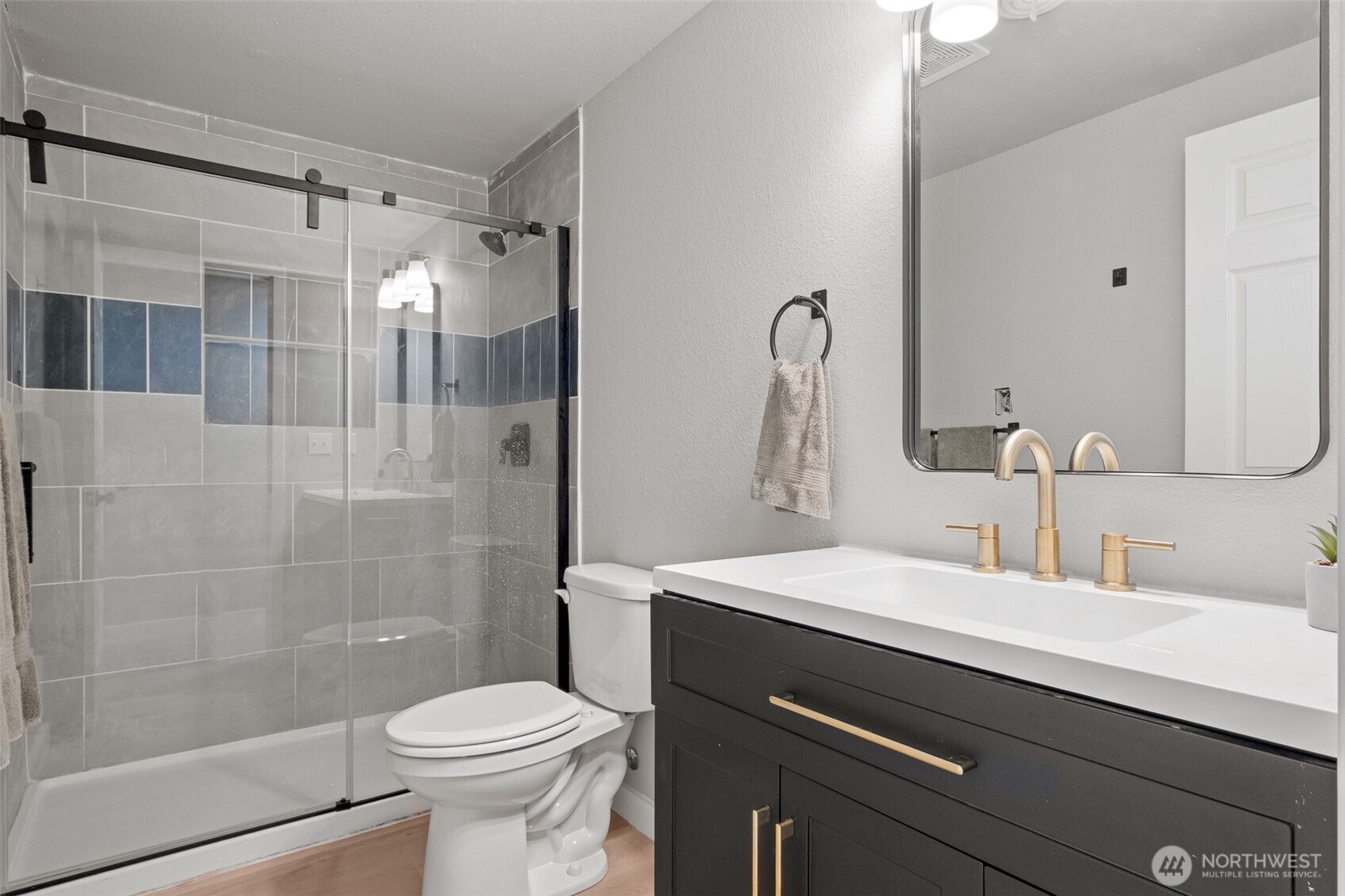 307 3rd Avenue Northeast Quincy, WA 98848 - Photo 17 of 26 a bathroom with a sink toilet and shower