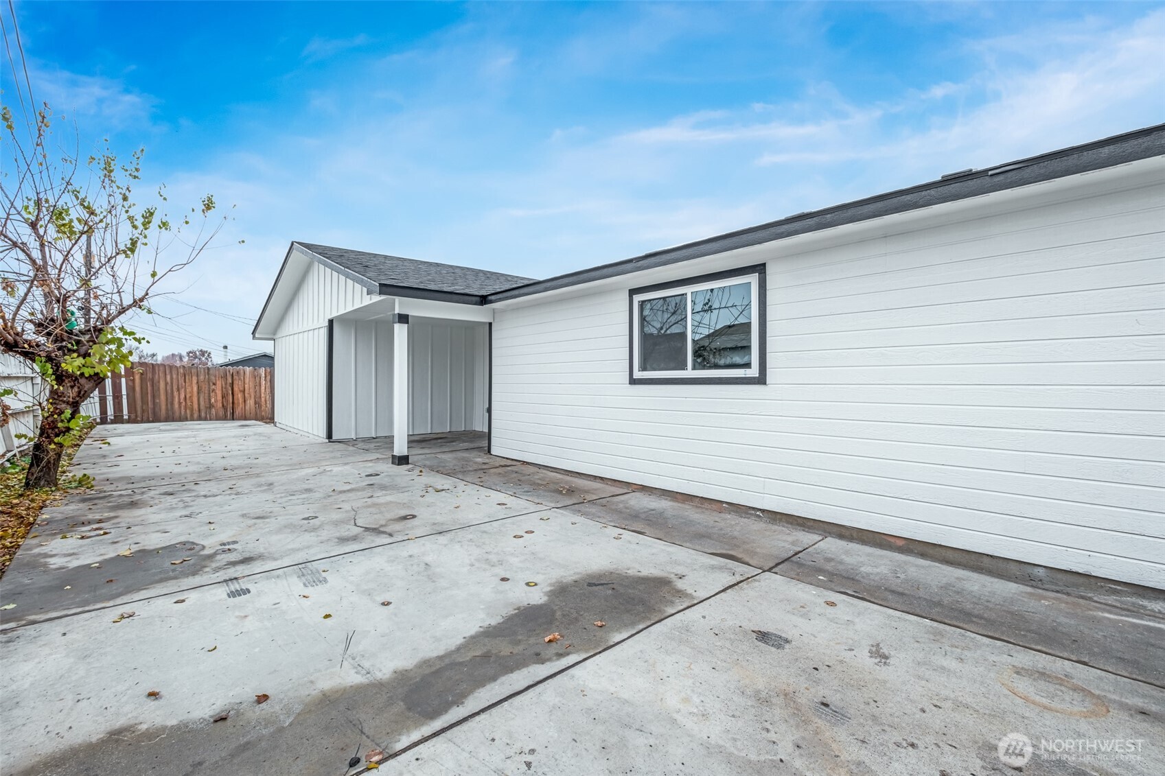 307 3rd Avenue Northeast Quincy, WA 98848 - Photo 22 of 26 a view of a house with a backyard