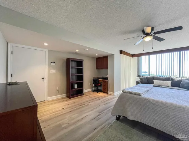 a view of a bathroom from a corridor