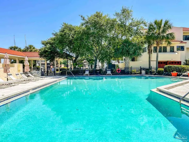 a view of a garden with houses