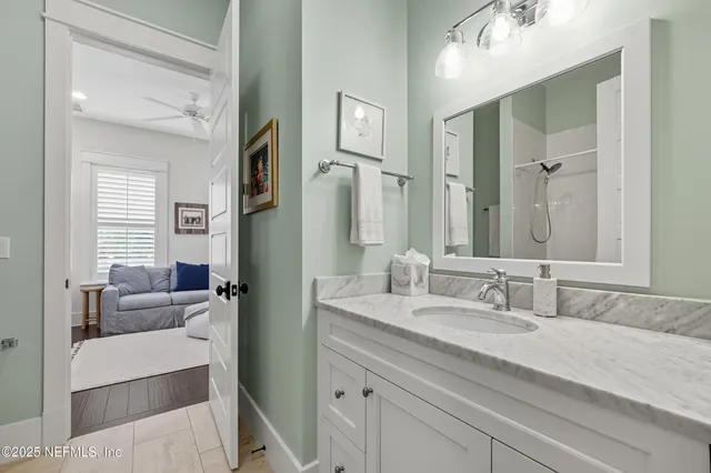a kitchen with stainless steel appliances white cabinets and a stove