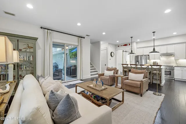 a bedroom with a bed a desk and chair