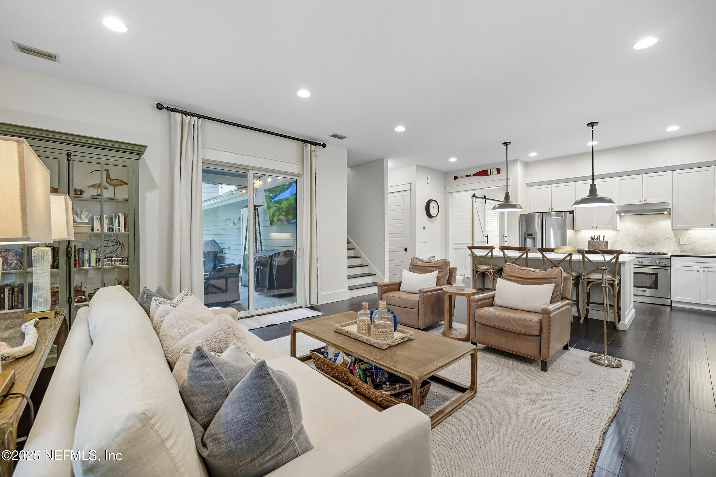 951 Paradise Circle Atlantic Beach, FL 32233 - Photo 22 of 76 a living room with furniture and a large window