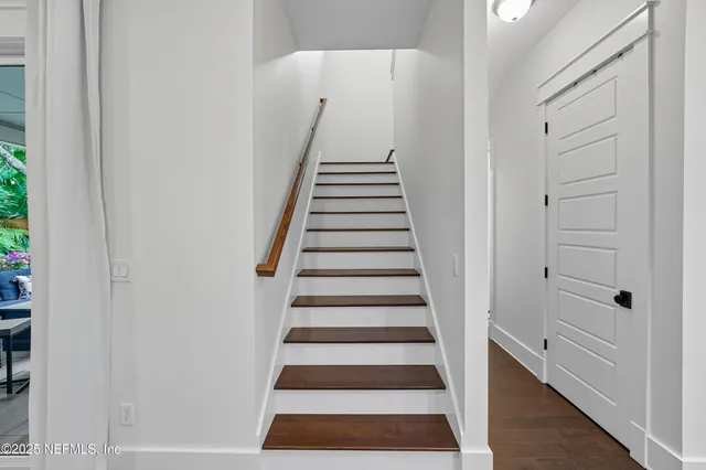 a utility room with sink dryer and washer