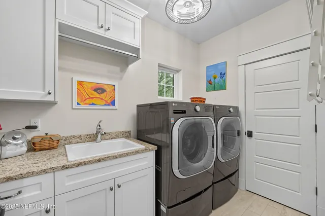 a aerial view of a house with a yard