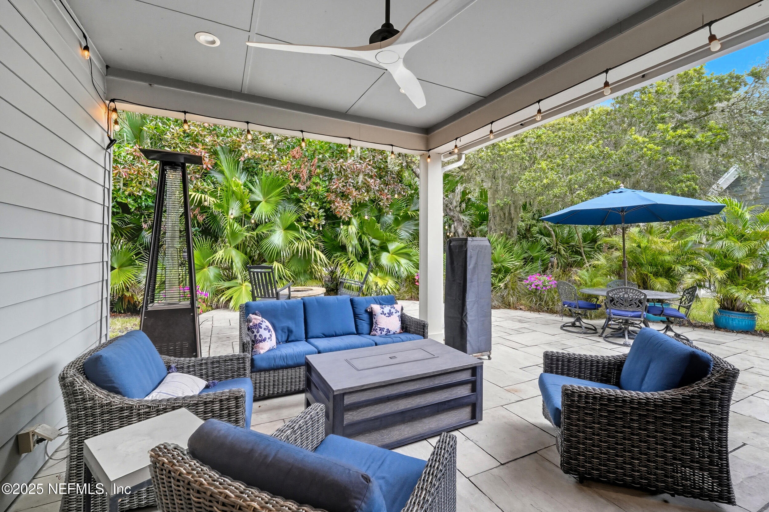 951 Paradise Circle Atlantic Beach, FL 32233 - Photo 34 of 76 a outdoor living space with furniture and garden view