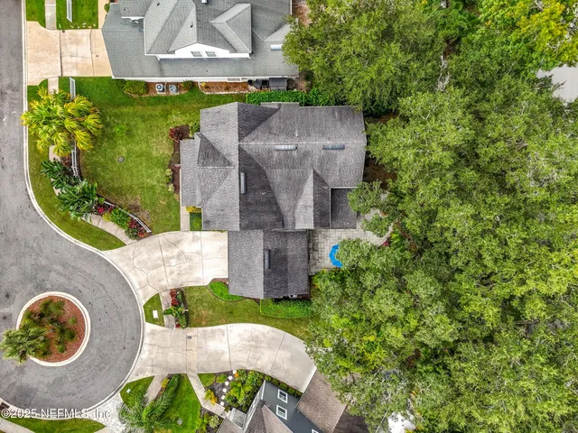 a view of a building with a palm tree