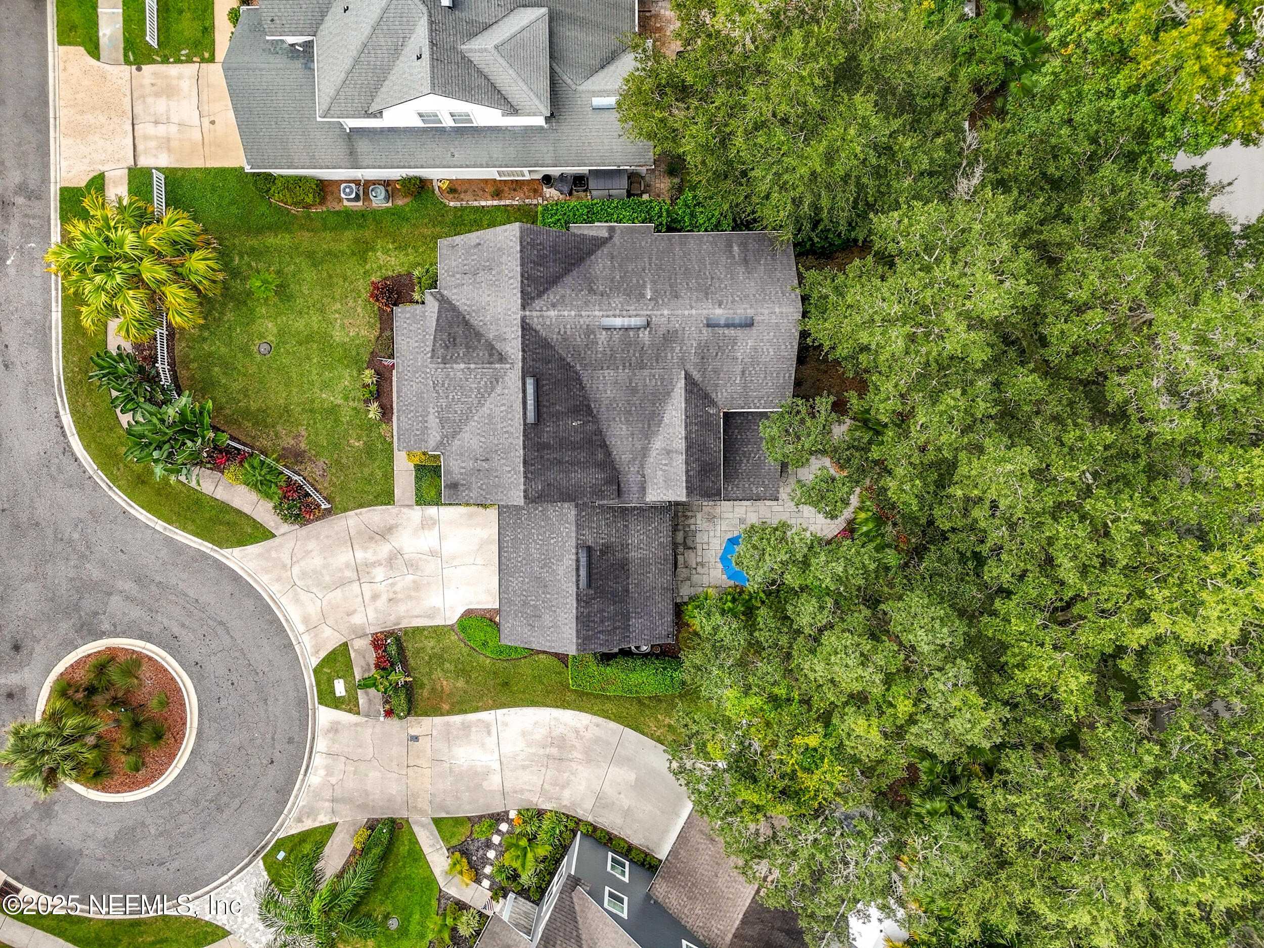 951 Paradise Circle Atlantic Beach, FL 32233 - Photo 40 of 76 an aerial view of a house with garden space and a lake view