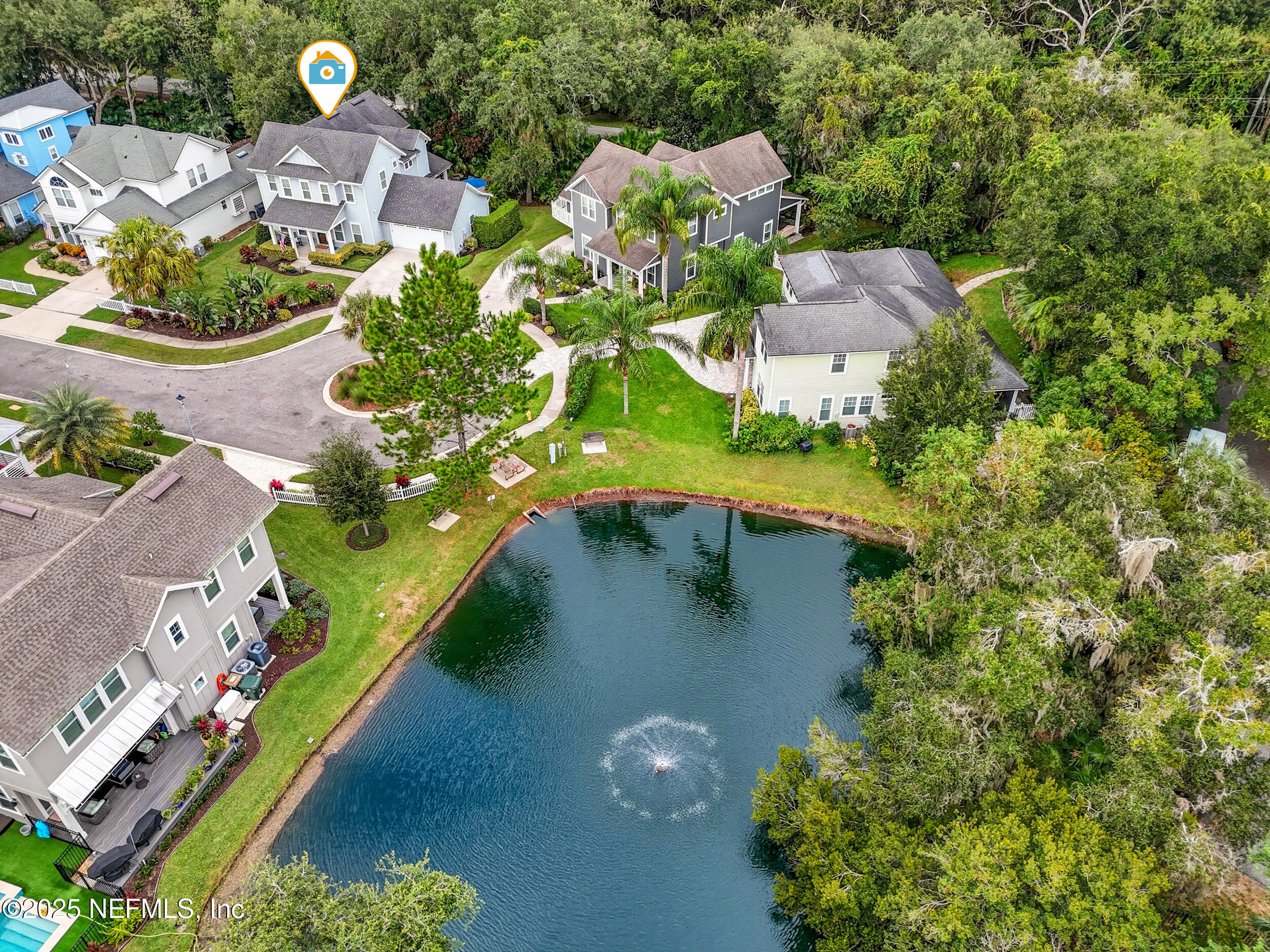 951 Paradise Circle Atlantic Beach, FL 32233 - Photo 42 of 76 an aerial view of a house with a yard