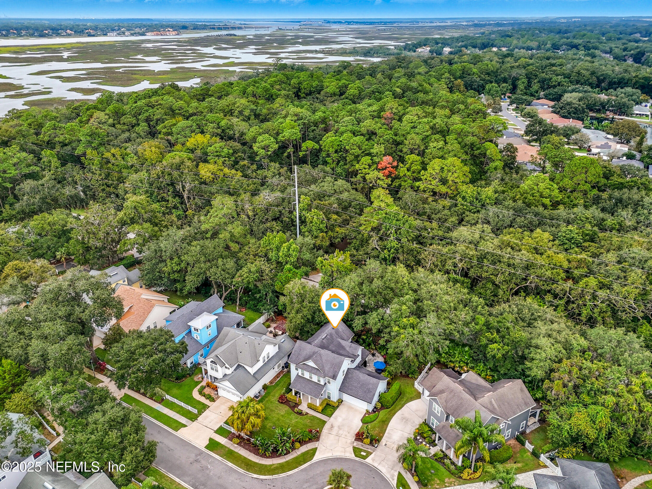 951 Paradise Circle Atlantic Beach, FL 32233 - Photo 45 of 76 a aerial view of a house with a yard