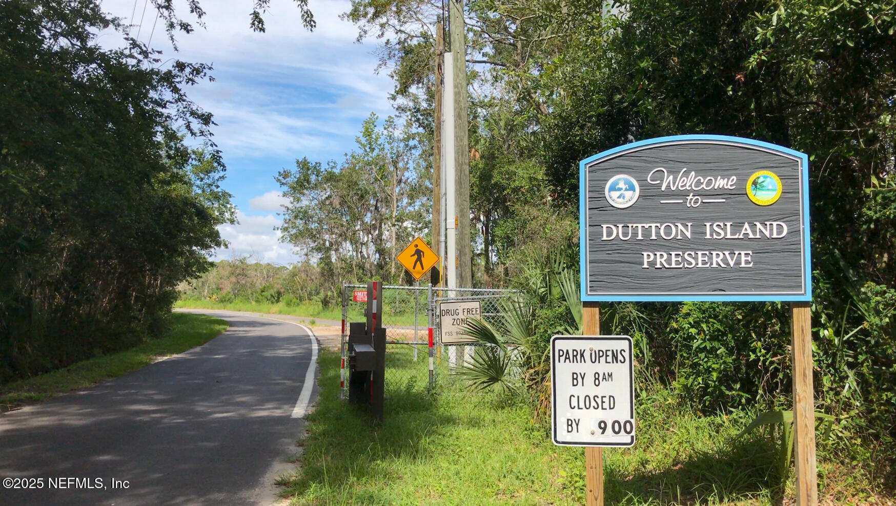 951 Paradise Circle Atlantic Beach, FL 32233 - Photo 47 of 76 a view of a street with benches in the background
