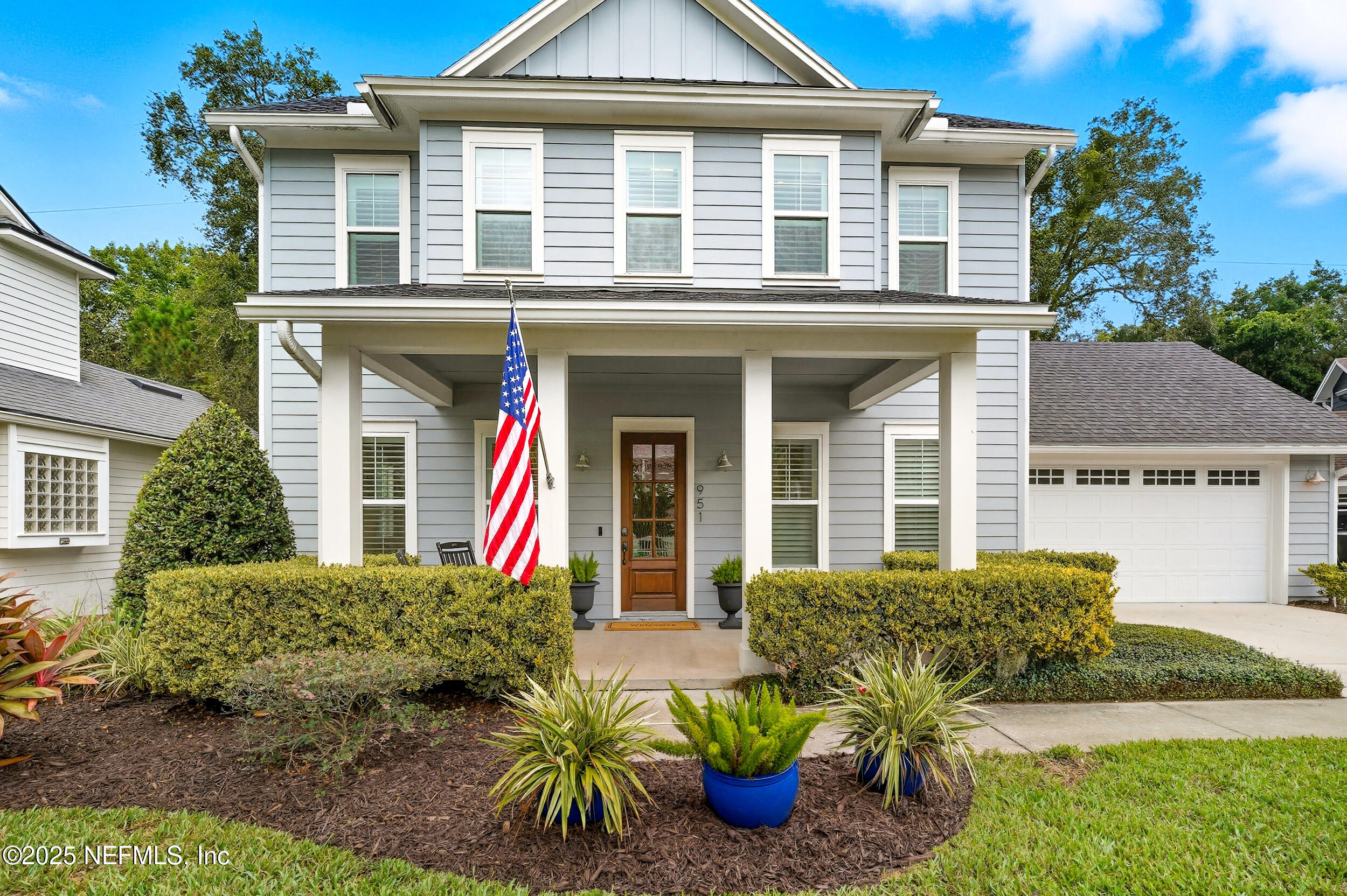 951 Paradise Circle Atlantic Beach, FL 32233 - Photo 5 of 76 front view of a house with a yard
