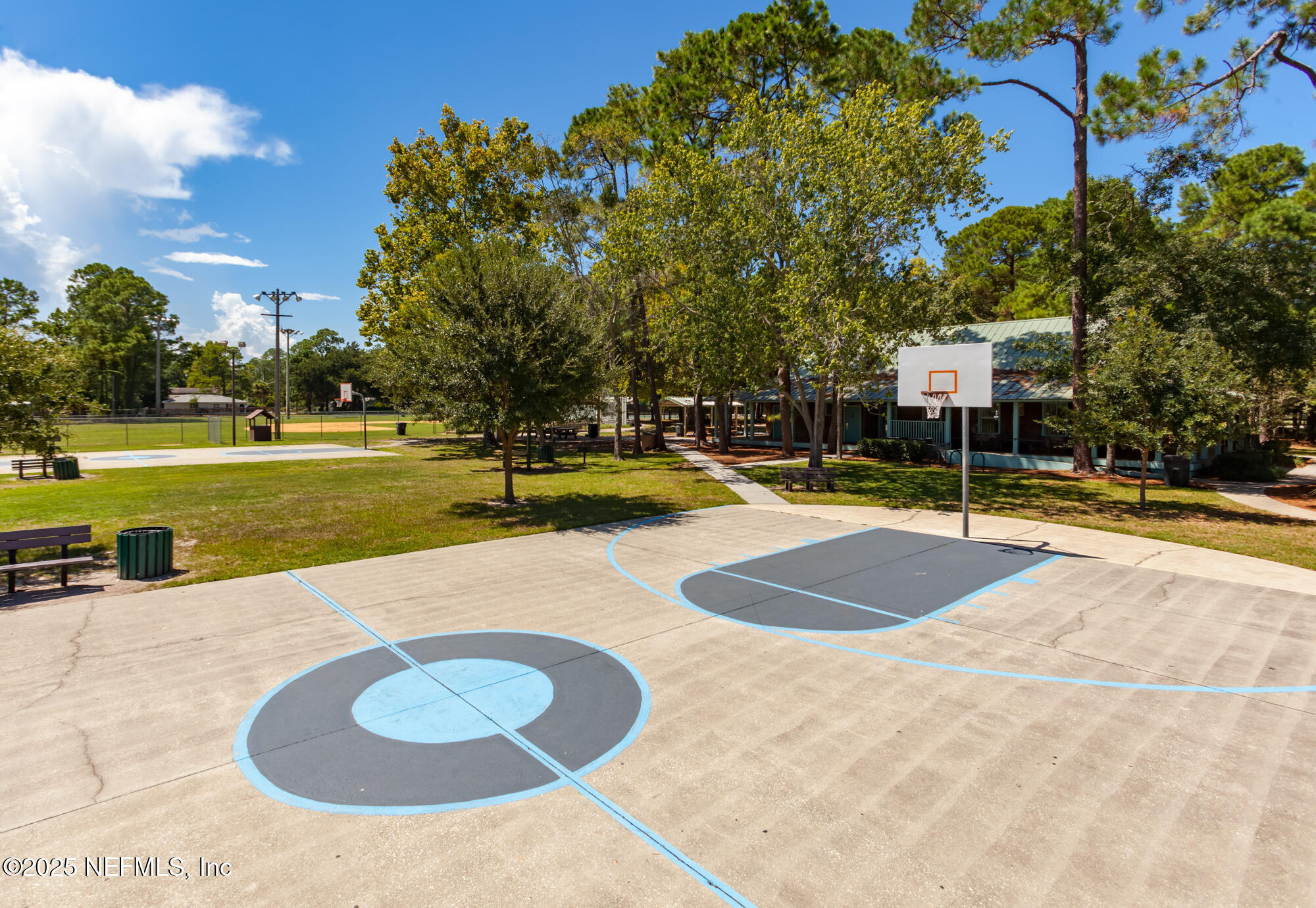 951 Paradise Circle Atlantic Beach, FL 32233 - Photo 68 of 76 a view of a swimming pool with a patio