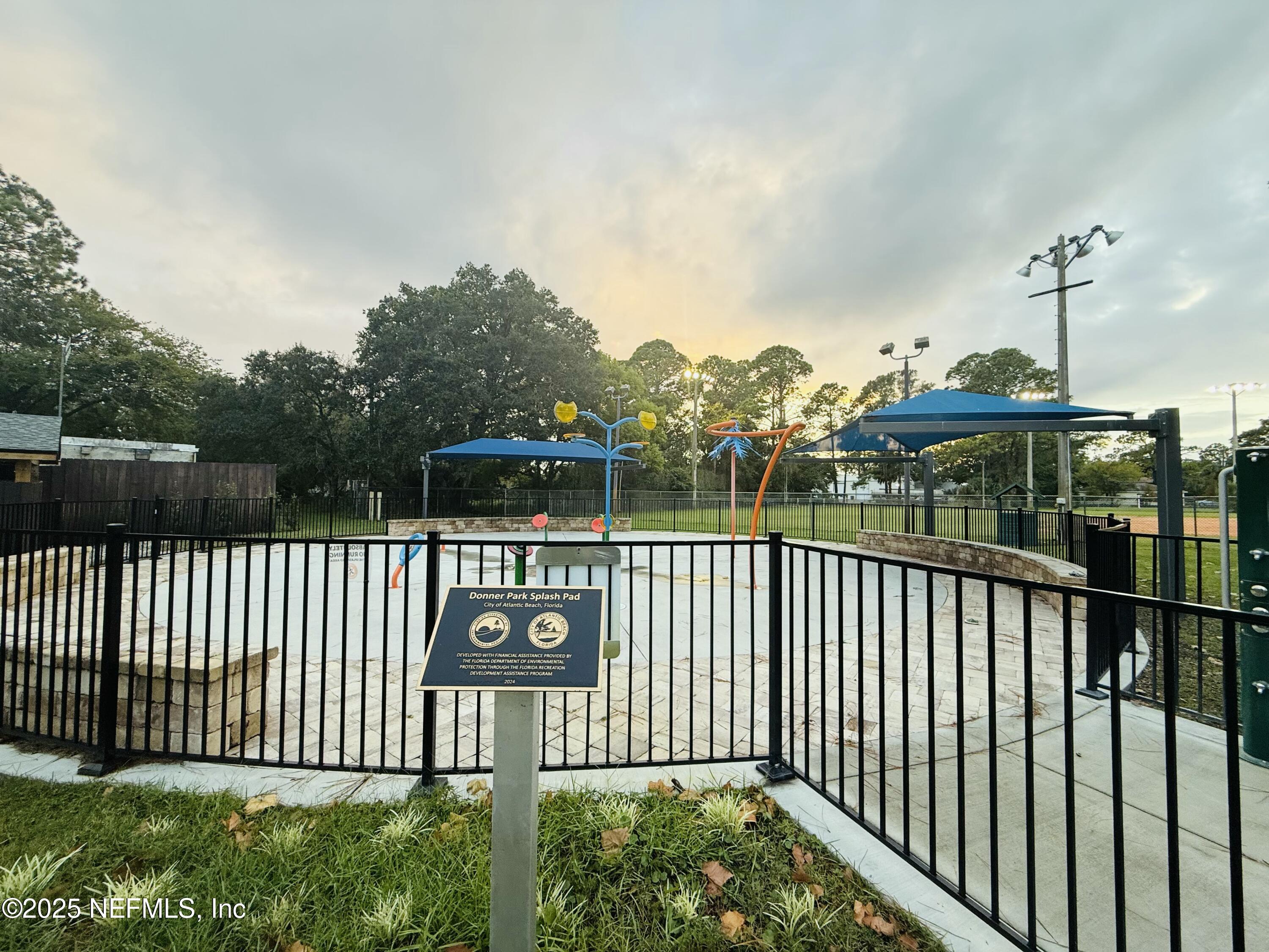 951 Paradise Circle Atlantic Beach, FL 32233 - Photo 69 of 76 a view of a wrought iron fences in front of house
