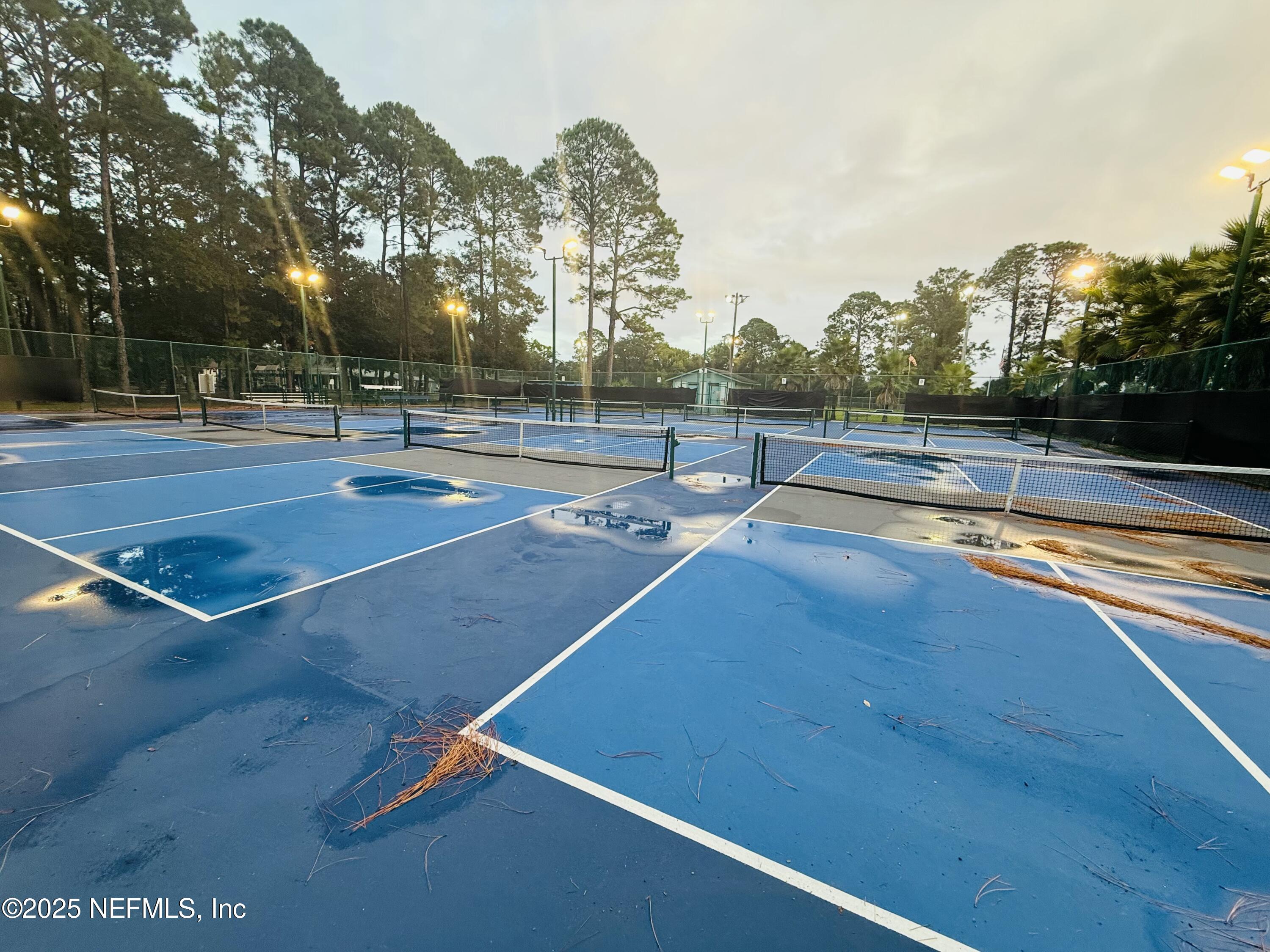 951 Paradise Circle Atlantic Beach, FL 32233 - Photo 71 of 76 a view of a tennis court