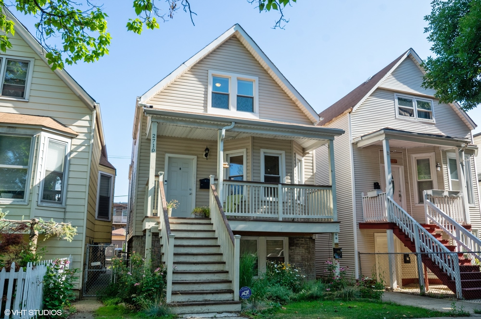 a front view of house with a yard