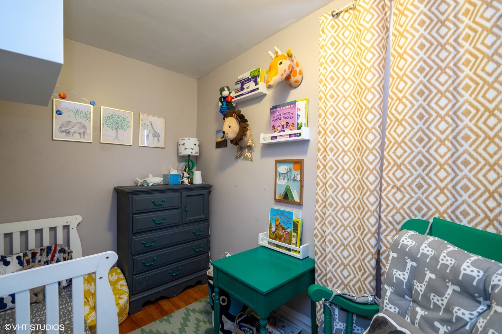 2710 West Fletcher Street Chicago, IL 60618 - Photo 11 of 24 a room that has a couch and a bookshelf in it