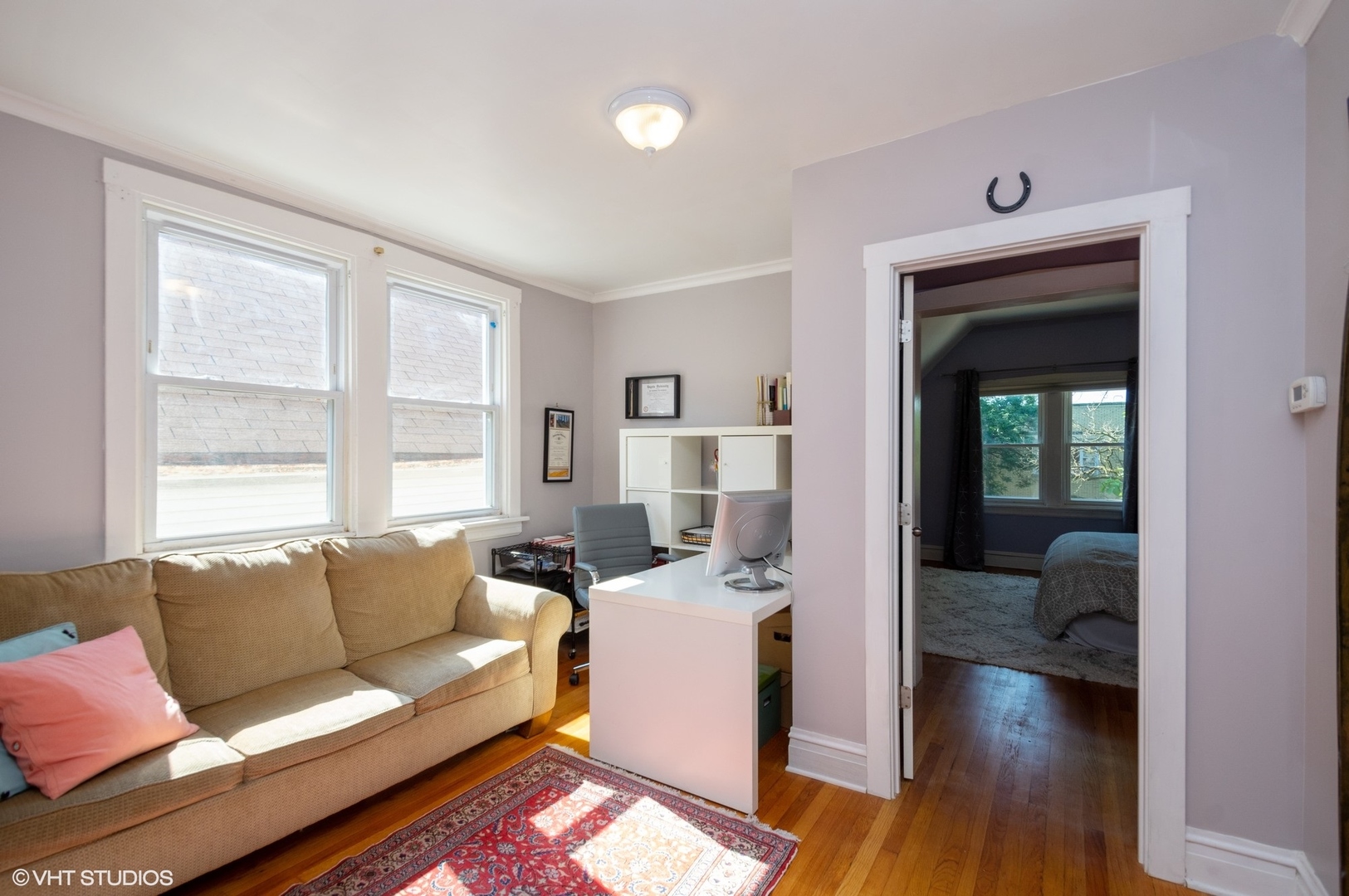 2710 West Fletcher Street Chicago, IL 60618 - Photo 12 of 24 a living room with furniture and a large window