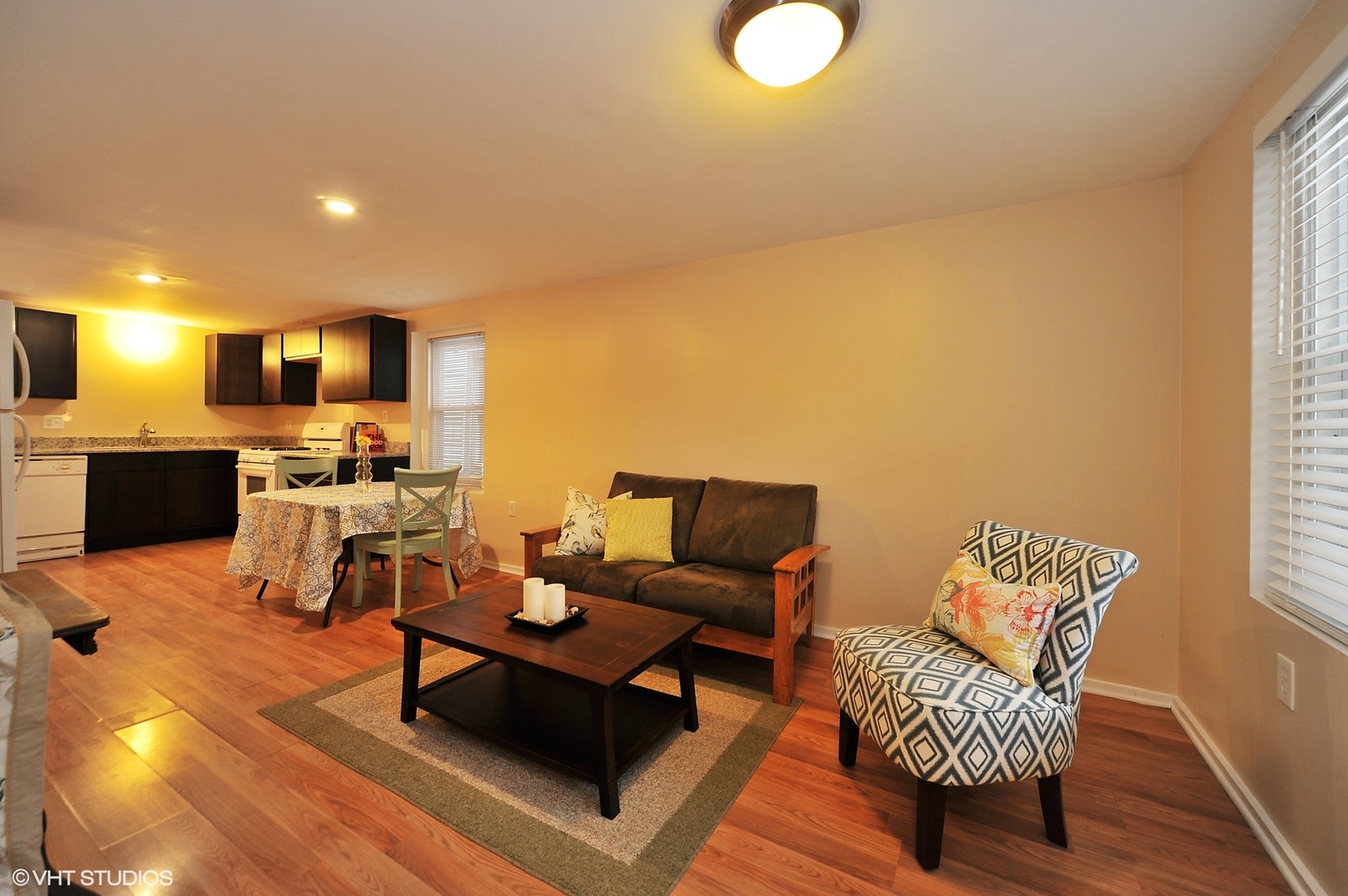 2710 West Fletcher Street Chicago, IL 60618 - Photo 16 of 24 a living room with furniture and a wooden floor