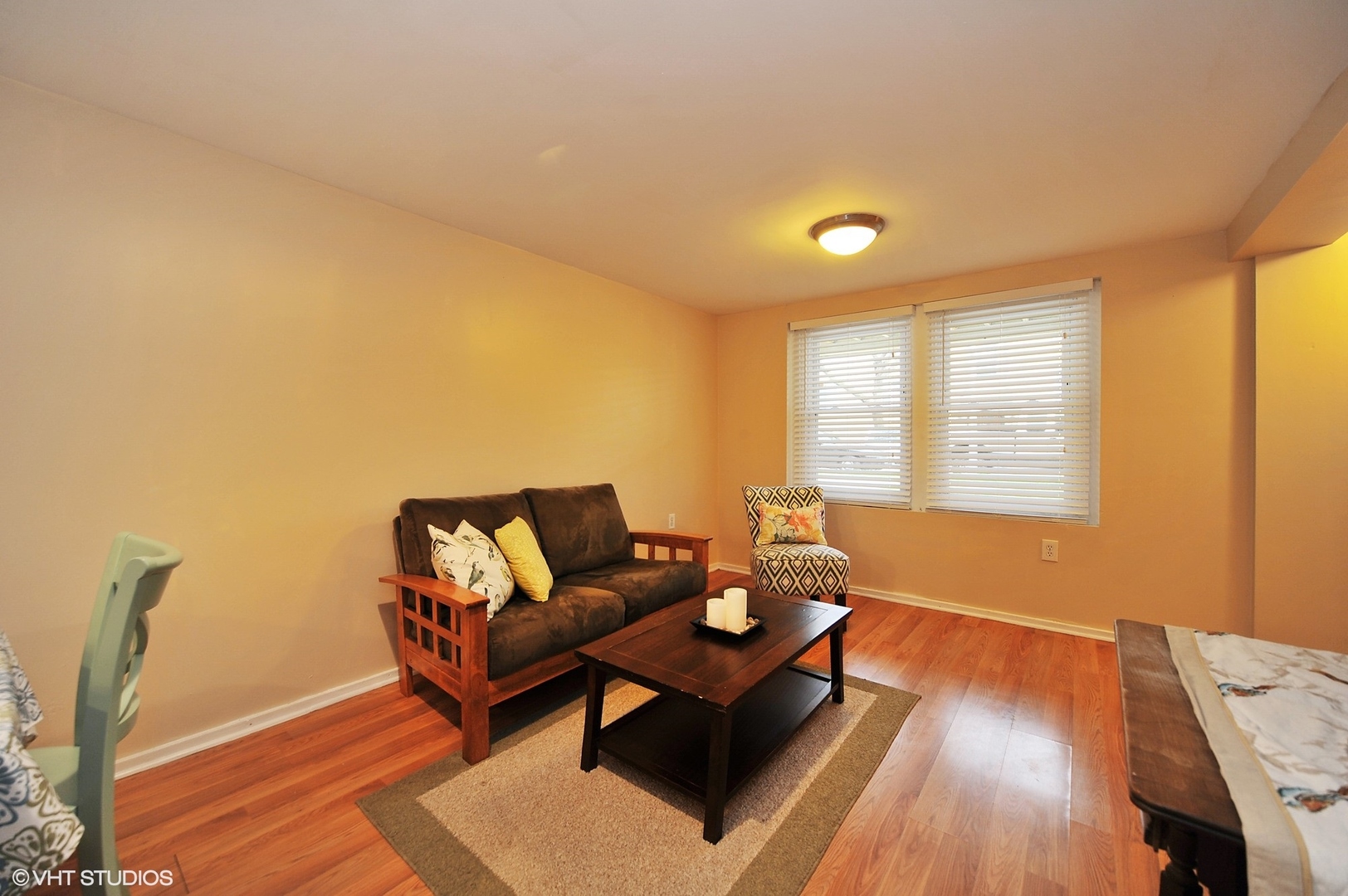 2710 West Fletcher Street Chicago, IL 60618 - Photo 17 of 24 a living room with furniture and a wooden floor