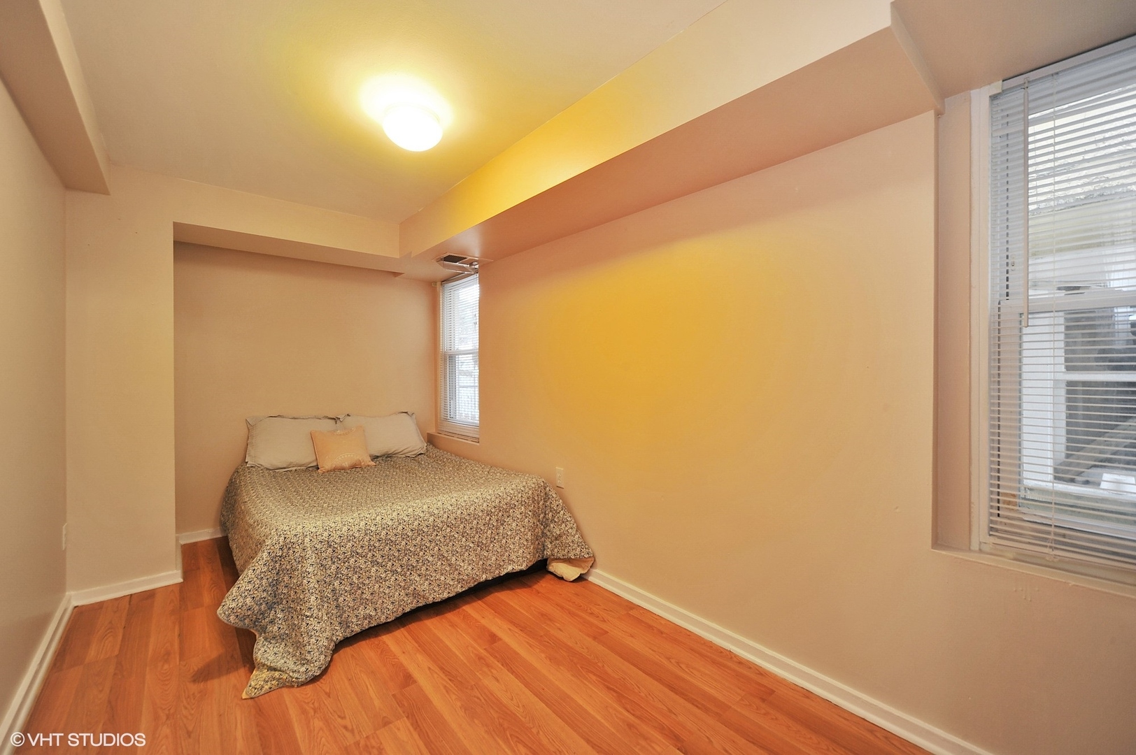 2710 West Fletcher Street Chicago, IL 60618 - Photo 21 of 24 a bedroom with a bed and a window