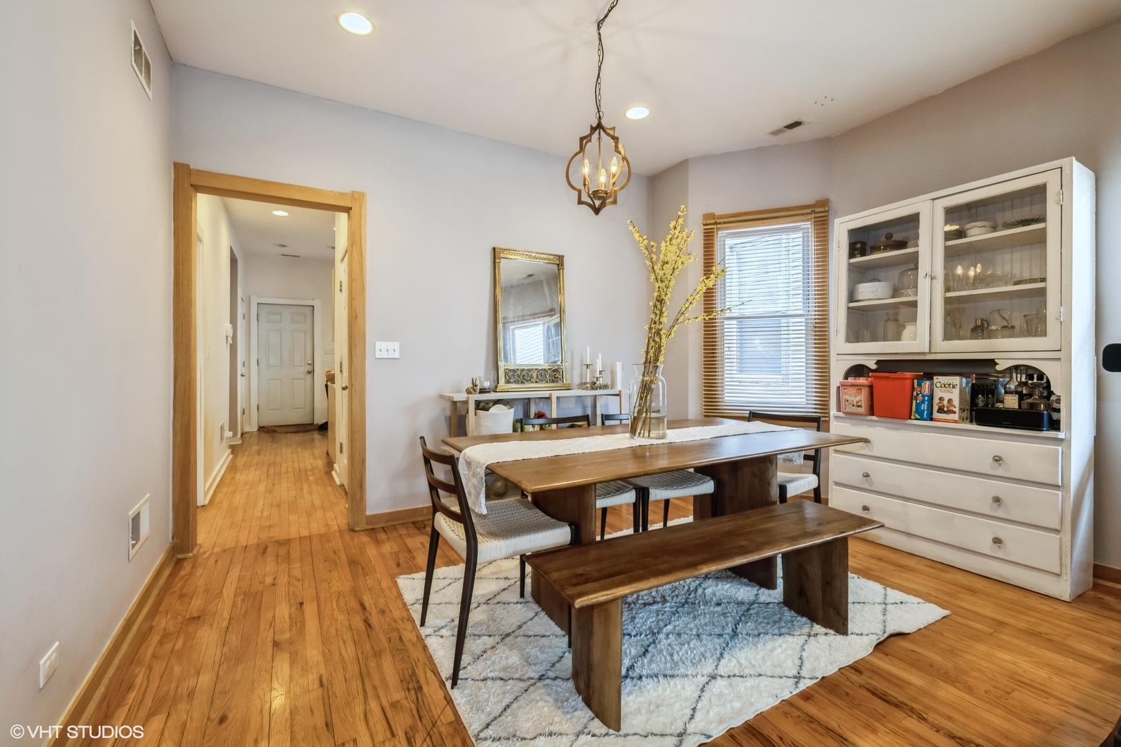 2710 West Fletcher Street Chicago, IL 60618 - Photo 6 of 24 a living room with stainless steel appliances granite countertop furniture and a chandelier