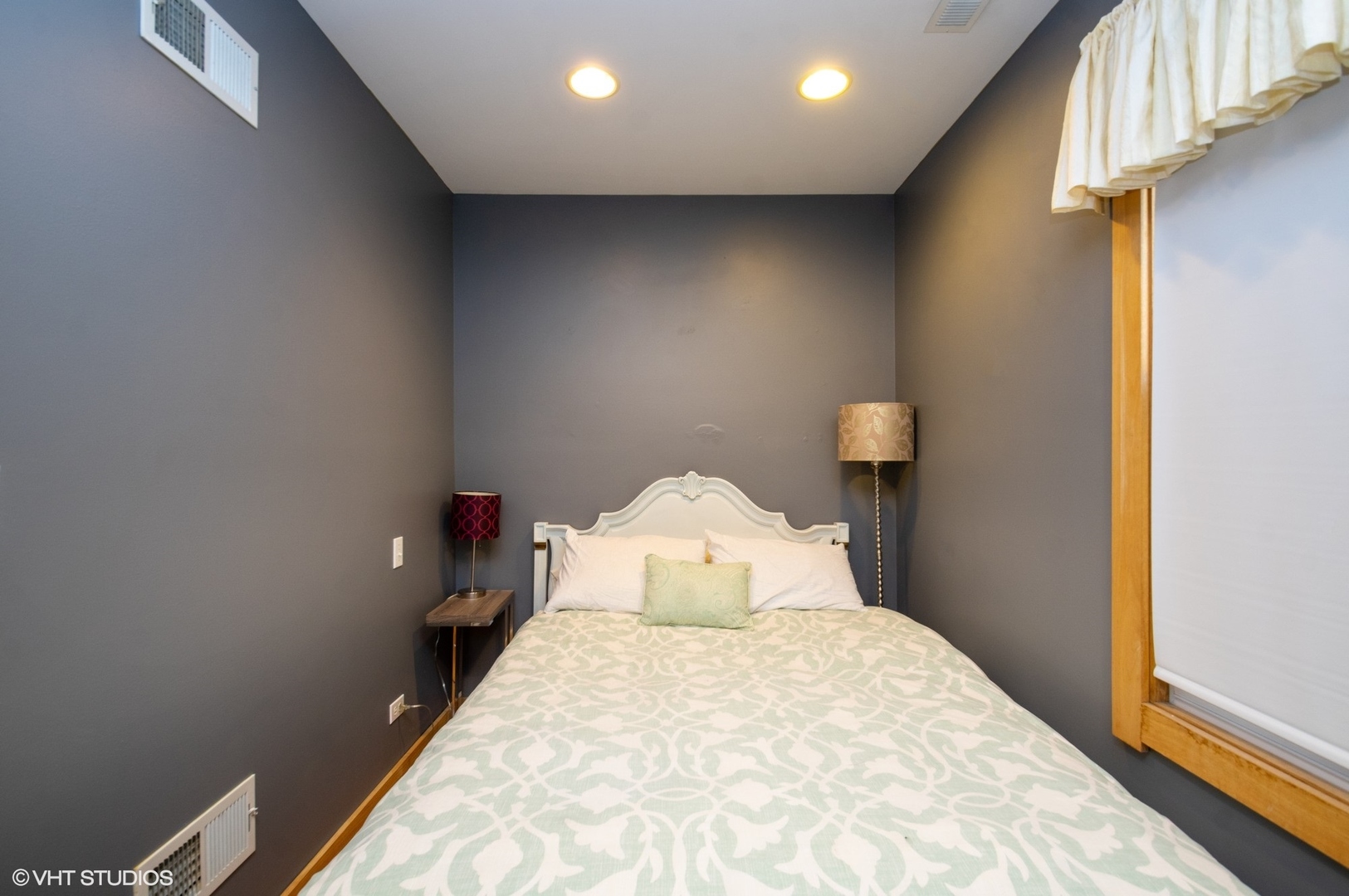 2710 West Fletcher Street Chicago, IL 60618 - Photo 7 of 24 a bedroom with a bed and chair