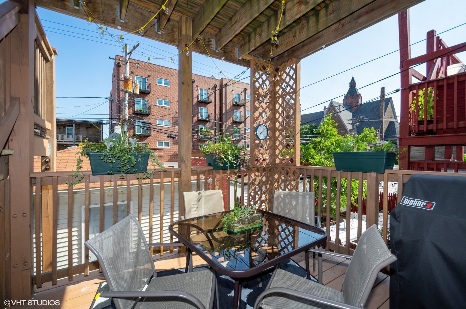 2710 West Fletcher Street Chicago, IL 60618 - Photo 9 of 24 a view of a chairs and table in the patio