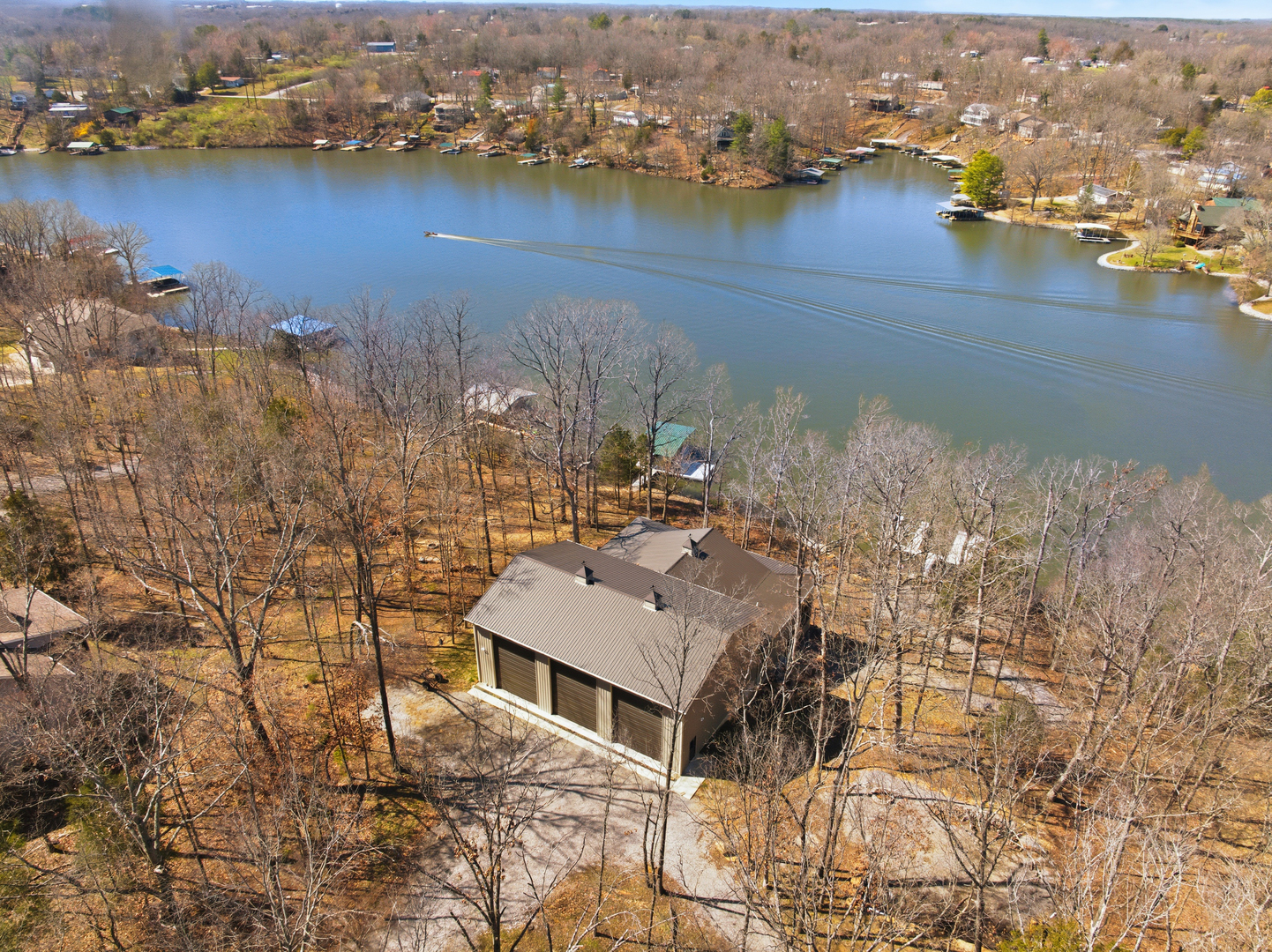 3675 Parrish Ridge Lane Goreville, IL 62939 - Photo 2 of 43 an aerial view of a house with a lake view