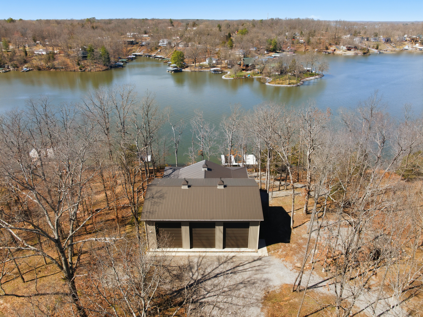 3675 Parrish Ridge Lane Goreville, IL 62939 - Photo 3 of 43 an aerial view of a house with a lake view
