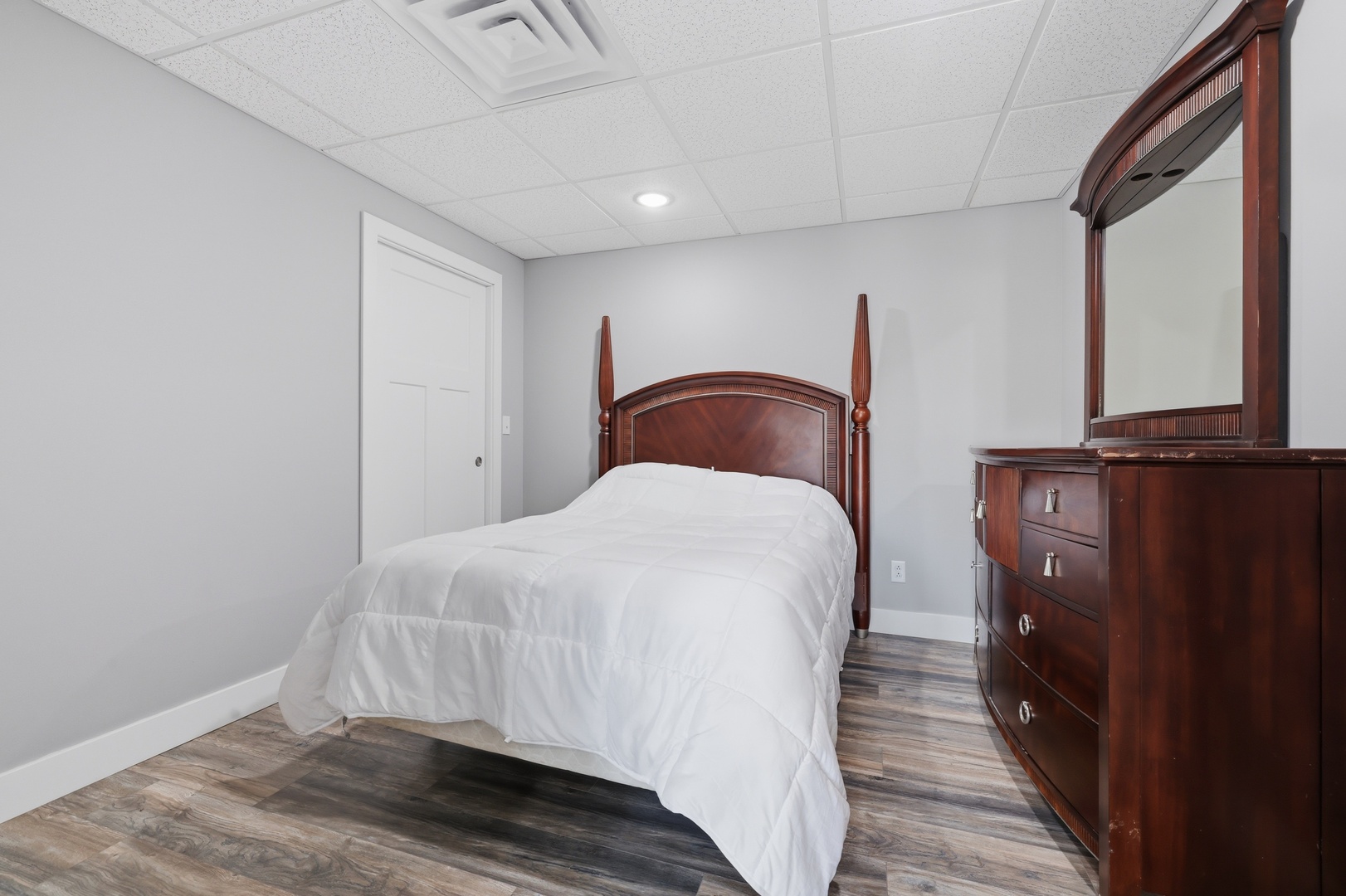3675 Parrish Ridge Lane Goreville, IL 62939 - Photo 38 of 43 a bedroom with a bed and wooden floor