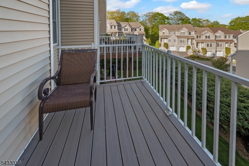158 Autumn Ridge Road Morris Plains, NJ 07950 - Photo 15 of 26 a view of a balcony with wooden floor
