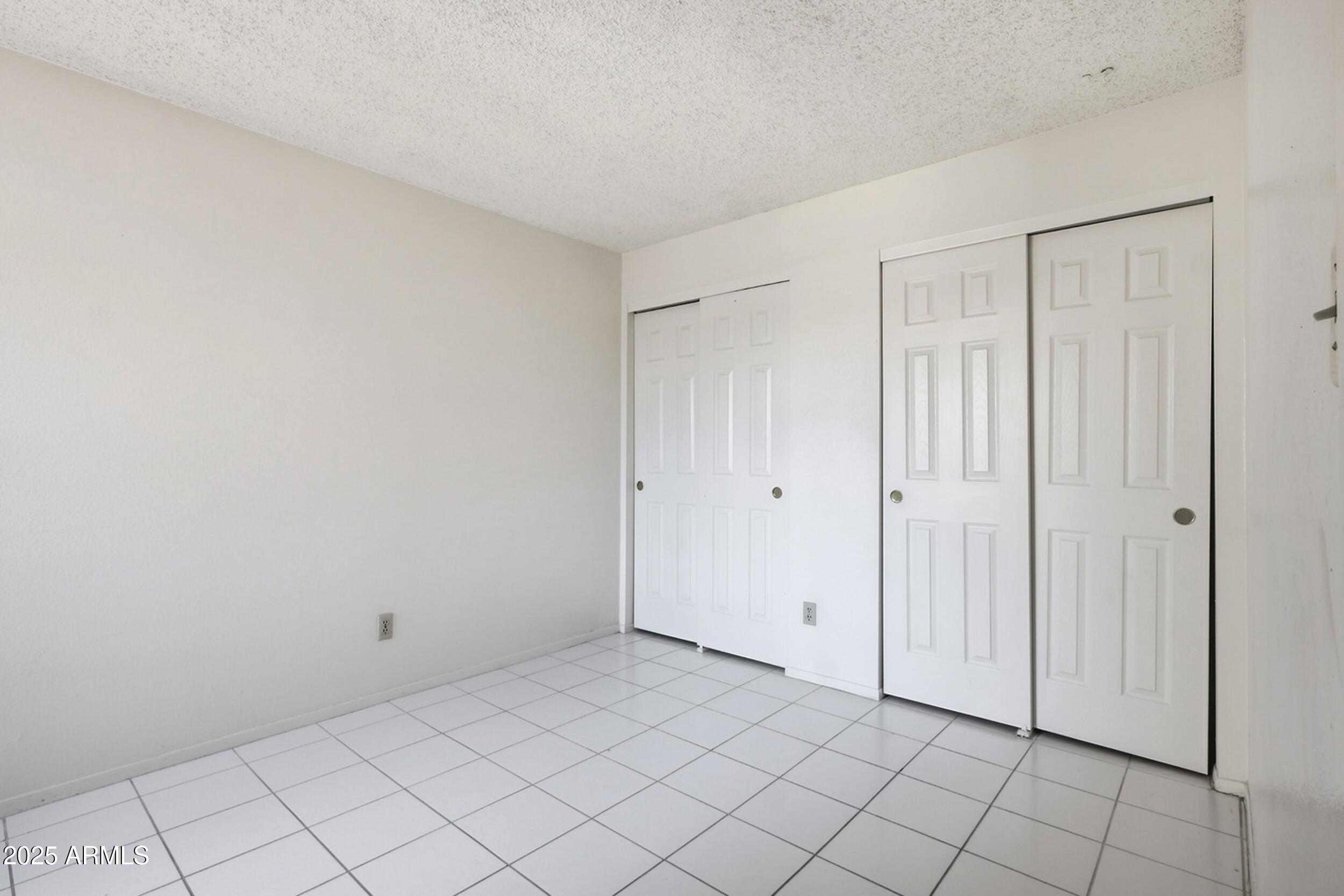 1831 East Kirkland Lane, Unit B Tempe, AZ 85288 - Photo 22 of 33 a view of an empty room