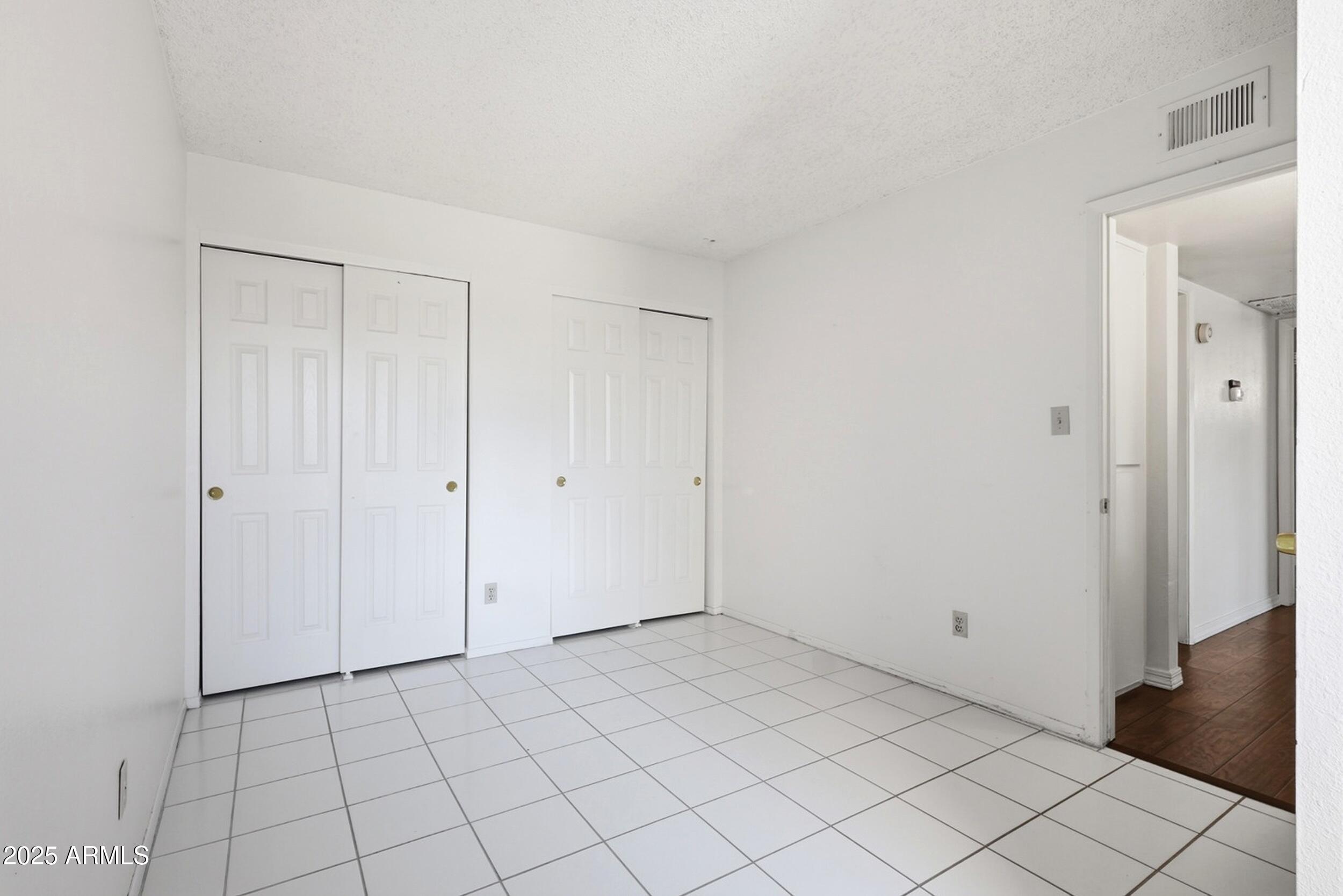 1831 East Kirkland Lane, Unit B Tempe, AZ 85288 - Photo 24 of 33 a view of an empty room