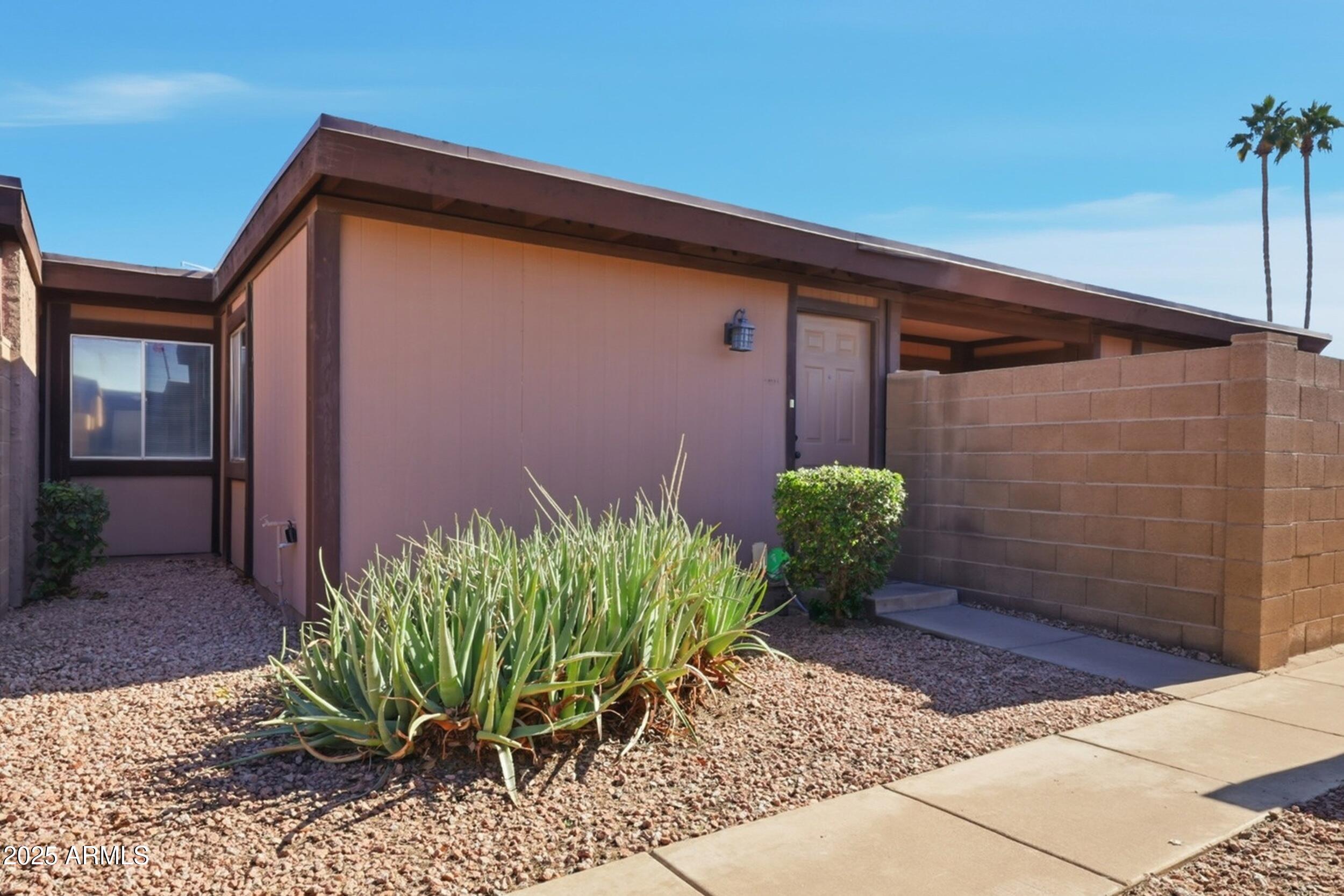 1831 East Kirkland Lane, Unit B Tempe, AZ 85288 - Photo 28 of 33 a view of a backyard with plants