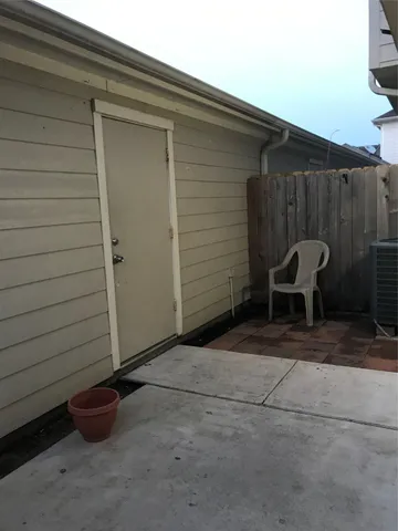 a view of backyard with cabin