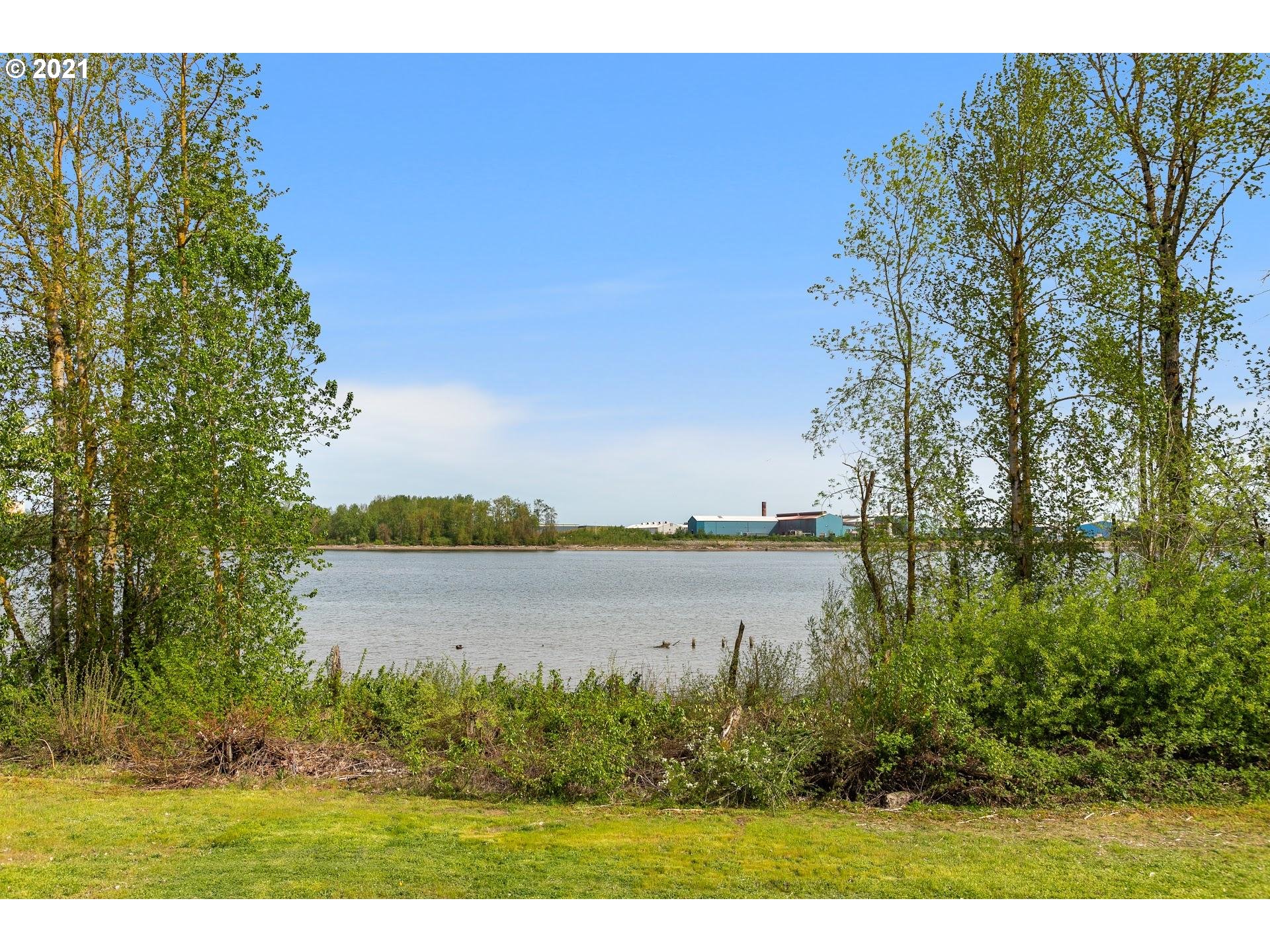 15620 Northwest Gillihan Road Portland, OR 97231 - Photo 27 of 29 a view of a lake with a lake