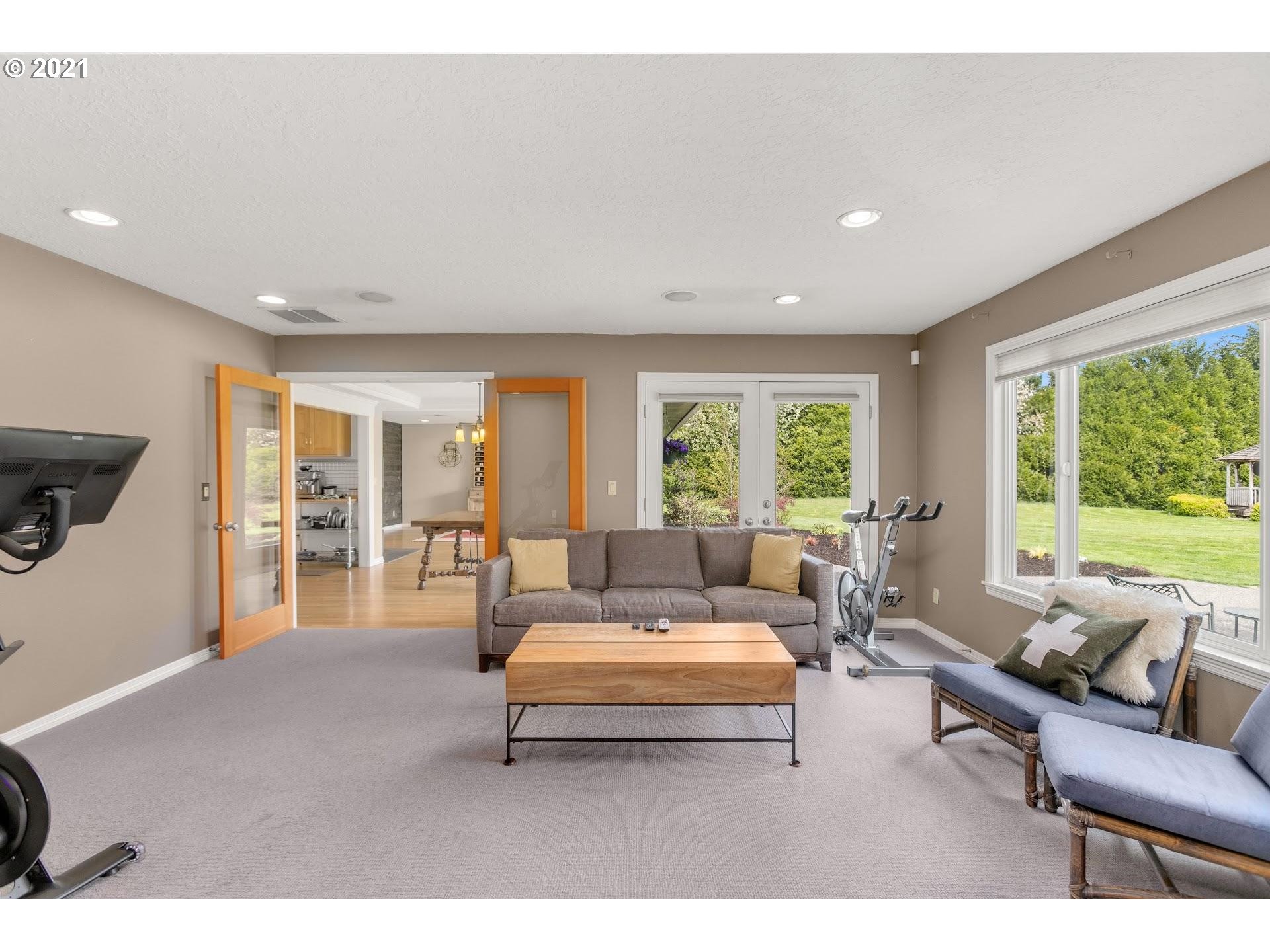 15620 Northwest Gillihan Road Portland, OR 97231 - Photo 10 of 29 a living room with furniture and a large window