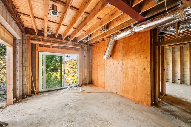 a view of an empty room with a sliding door