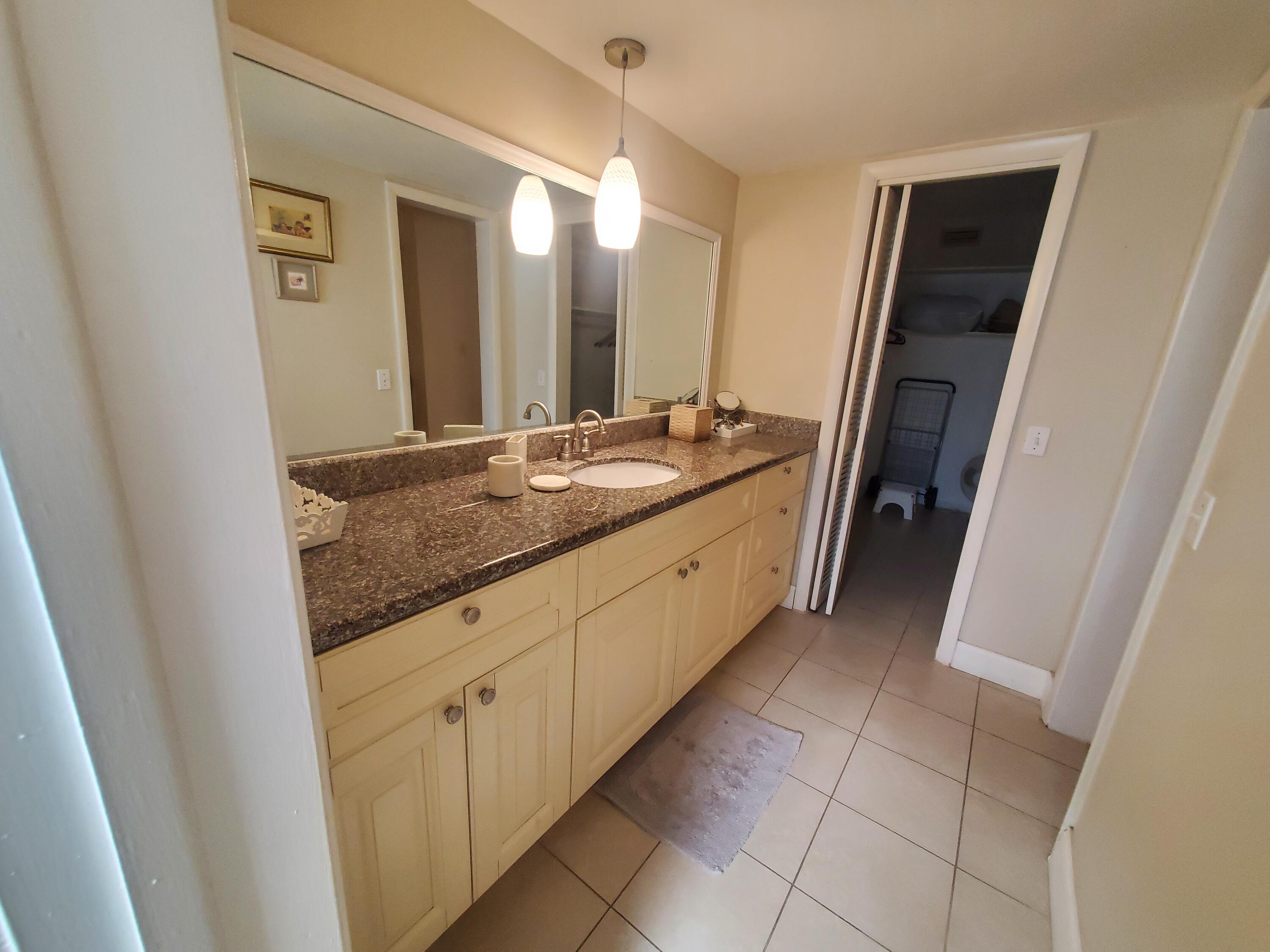20 Southeast 13th Street, Unit A6 Boca Raton, FL 33432 - Photo 7 of 14 master bathroom