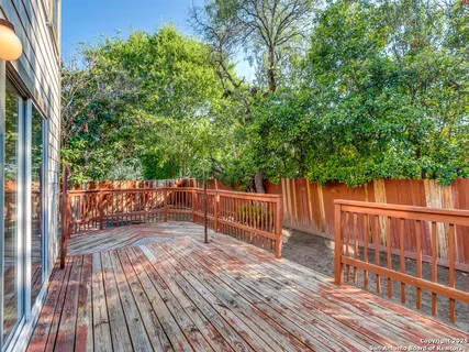 a view of deck with wooden floor and outdoor seating