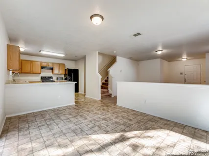 a view of a kitchen with a sink