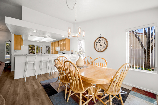1825 West Mathis Park Place, Unit 46 St. George, UT 84770 - Photo 11 of 45 Dining room with dark wood-style flooring and suspended lighting